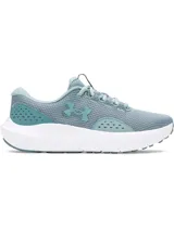 Championes de running Under Armour Charged Surge 4 color celeste con logo de la marca en el lateral.
