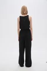 Pantalón ancho de viscosa con diseño color block y punto smock.
