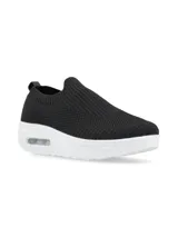 Zapatilla negra de flyknit con suela blanca y burbuja de aire.