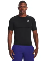 Remera de compresión negra de manga corta, cuello redondo y logo Under Armour estampado en el pecho.