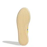 Championes urbanos Adidas Barreda Decode, color azul con detalles en amarillo y suela color crema.