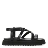 Sandalias blancas con tiras finas cruzadas y suela track color negro.