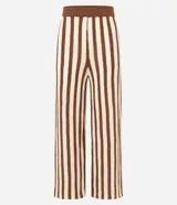 Conjunto de top sin mangas y pantalón palazzo a rayas verticales marrones y beige.