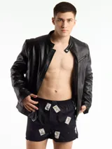 Bóxer de algodón blanco con estampado de flores pequeñas color celeste, con cintura elástica y logo de la marca en el centro.