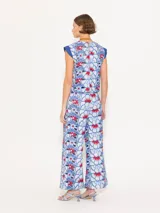 Pantalón wide leg de broderie poplin con recortes en el delantero y tajos en las botamangas. Cintura de lino azul y cierre lateral JCH teñido a tono.