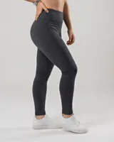 Calza larga ajustada, color gris oscuro melange, de tiro alto con faja doble tela sin elástico superior.