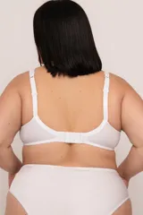 Soutien reductor blanco sin aro, con bretel ancho, confeccionado en LYCRA® con detalle de encaje celeste y microtul en copa. Breteles elásticos regulables y ganchos reforzados en espalda.