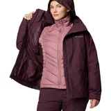 Campera Columbia Whirlibird V Interchange para mujer, color borgoña con interior rosa. Sistema Interchange 3 en 1 con capa exterior impermeable Omni-Tech™ y capa interior aislante Thermator™ de poliéster reciclado. Capucha ajustable, ventilación en las axilas, faldón para nieve, múltiples bolsillos y puños ajustables.