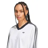 Remera corta blanca de mangas largas con cuello en V y tres tiras negras en los hombros.