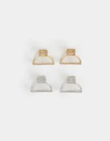 Set de cuatro broches metálicos para el cabello, dos dorados con incrustaciones de nácar y dos plateados.