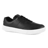 Championes negros de cuero sintético con suela blanca y cordones negros. Diseño casual y deportivo.