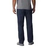 Pantalón negro de tela elástica utilitaria, con bolsillos para las manos y seguridad con cierre.