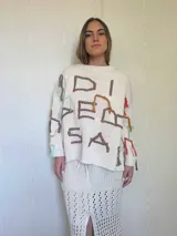 Sweater oversize de algodón tejido en punto jersey con bordados hechos a mano en hilos de colores y lurex.