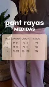 Pantalón de jersey térmico a rayas verticales color bordó y rosa, con elástico en la cintura.