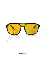 Lentes de sol negros con cristales amarillos polarizados y protección UV400.
