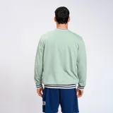Buzo azul de corte clásico, con detalles de líneas en los bordes y logo de Umbro en el pecho.