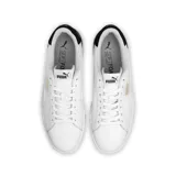 Championes Puma Serve Pro de cuero blanco con detalles en gamuza negra en el talón y logo dorado en el lateral.