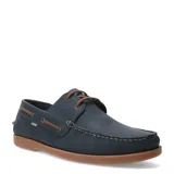 Zapato náutico de cuero azul marino con cordones marrones y suela de goma color caramelo.