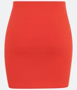 Minifalda roja de media malla, ajustada al cuerpo y con cintura elástica.