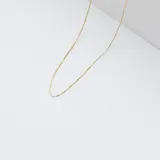 Cadena de oro amarillo 18k con eslabones cuadrados.