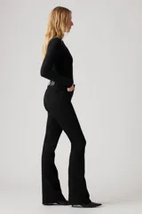 Pantalón de jean negro de tiro alto y corte flare.