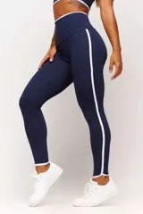 Calza deportiva azul marino con cintura alta y detalles en blanco en cintura y laterales.