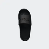 Ojotas tipo slide Umbro Twise, color azul vibrante, con tira ancha que lleva el logo de Umbro en relieve en color blanco.