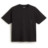 Remera negra de manga corta con cuello redondo y logo de Vans en el pecho.