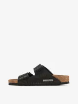 Sandalias Birkenstock modelo Arizona, color negro con estampado de cebra.