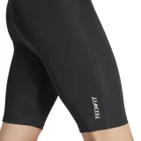 Calza corta de compresión Adidas Techfit negra con logo blanco en la pierna izquierda y cintura elástica con la inscripción Techfit en gris.