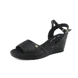 Sandalia negra con taco corrido de 6 cm de altura.