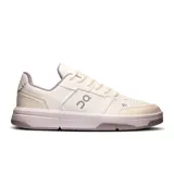 Championes urbanos blancos con detalles en gris y lila, de cuero sintético y suela de goma.