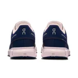 Championes de running azules con detalles en blanco y logo de la marca en el lateral.