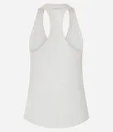 Musculosa deportiva de tule color crudo, con escote redondo y espalda nadadora. Presenta encaje en los laterales.