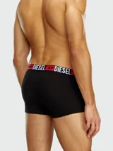 Bóxer negro de algodón con cintura elástica roja y logo "DIESEL" en blanco.