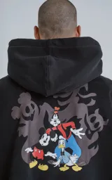 Buzo con capucha negro de frisa de algodón con calce oversize. Estampado de Mickey Mouse en el pecho y cordones con texto.