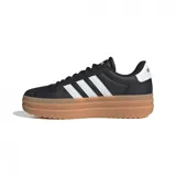 Championes urbanos Adidas VL Court Bold de mujer, color negro con las tres tiras blancas y suela marrón de plataforma.