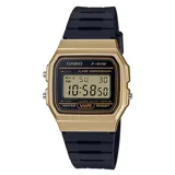 Reloj digital Casio F-91W con caja dorada y correa de resina negra.