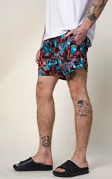 Short de baño de microfibra con estampado de caballos en tonos azul y naranja.