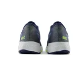 Championes de running New Balance modelo Fresh Foam X 880v12, color azul con detalles en gris, blanco y verde.