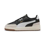 Championes Puma Shuffle Downtown OG de cuero sintético negro con detalles en blanco y beige.