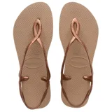 Ojotas Havaianas modelo Luna, color rosado con tiras finas con diseño trenzado y tira trasera.