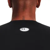 Remera de compresión Under Armour HeatGear negra de manga corta, con logo blanco en el pecho.