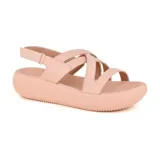 Sandalias negras de cuero Usaflex con plataforma, tiras cruzadas y ajuste con velcro.