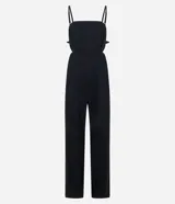 Mono largo color blanco, de breteles finos y escote recto. Presenta recorte cut-out en la cintura y lazo en la espalda.