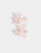Set de dos hebillas para el pelo con moño de satén rosa y apliques de perlas.