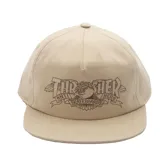 Gorro de visera beige con logo de Thrasher bordado en marrón.