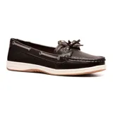 Zapato náutico de cuero negro con cordones y suela blanca.