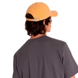 Gorro tipo baseball de tela pigmentada, con logotipo de Cat bordado al frente.