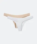 Kit de dos bombachas tipo bikini hilo, una color blanco y otra color piel, confeccionadas en poliamida con corte a láser.